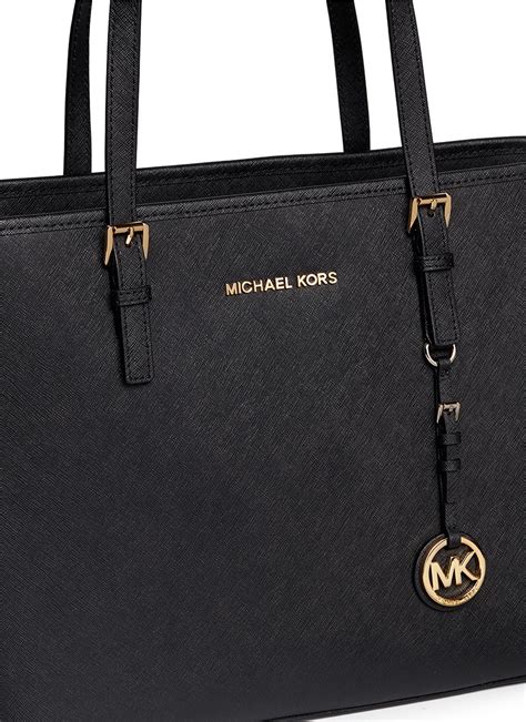 michael kors black jet set travel md tote leather|Michael Kors airplane print.